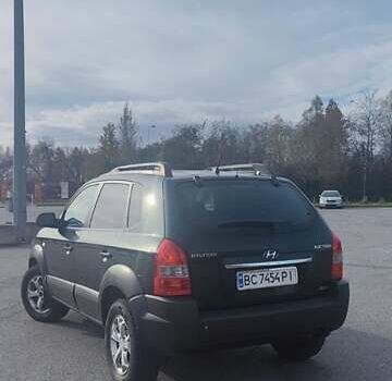 Зеленый Хендай Туксон, объемом двигателя 1.98 л и пробегом 220 тыс. км за 6800 $, фото 6 на Automoto.ua