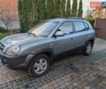 Зеленый Хендай Туксон, объемом двигателя 1.98 л и пробегом 200 тыс. км за 8000 $, фото 1 на Automoto.ua