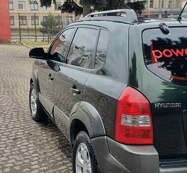 Зеленый Хендай Туксон, объемом двигателя 2 л и пробегом 115 тыс. км за 8500 $, фото 5 на Automoto.ua