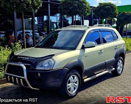 Зеленый Хендай Туксон, объемом двигателя 2 л и пробегом 186 тыс. км за 8600 $, фото 6 на Automoto.ua