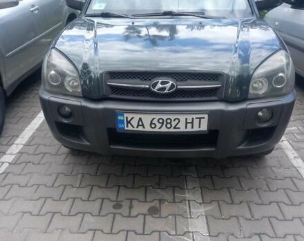 Зеленый Хендай Туксон, объемом двигателя 1.98 л и пробегом 270 тыс. км за 8100 $, фото 3 на Automoto.ua
