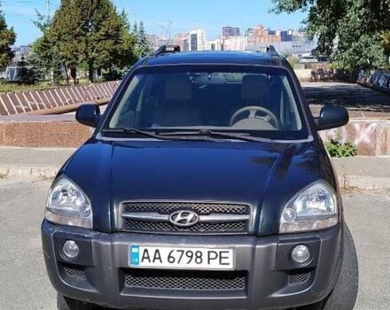 Зеленый Хендай Туксон, объемом двигателя 1.98 л и пробегом 200 тыс. км за 7000 $, фото 1 на Automoto.ua