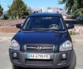 Зеленый Хендай Туксон, объемом двигателя 1.98 л и пробегом 200 тыс. км за 7000 $, фото 1 на Automoto.ua