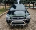 Зеленый Хендай Туксон, объемом двигателя 2 л и пробегом 115 тыс. км за 8500 $, фото 1 на Automoto.ua