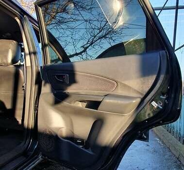 Зеленый Хендай Туксон, объемом двигателя 2 л и пробегом 115 тыс. км за 8500 $, фото 82 на Automoto.ua