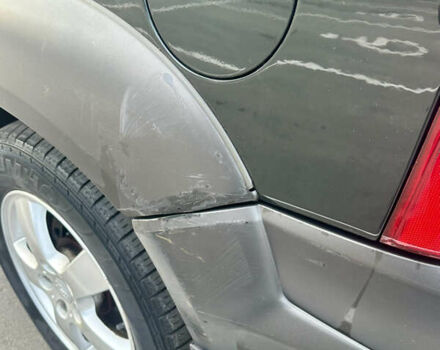 Зелений Хендай Туксон, об'ємом двигуна 1.98 л та пробігом 156 тис. км за 7999 $, фото 7 на Automoto.ua