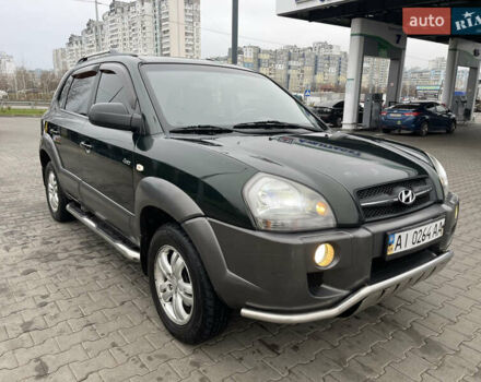Зеленый Хендай Туксон, объемом двигателя 1.98 л и пробегом 295 тыс. км за 5950 $, фото 10 на Automoto.ua