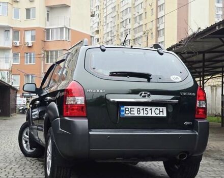 Зеленый Хендай Туксон, объемом двигателя 1.98 л и пробегом 178 тыс. км за 8900 $, фото 9 на Automoto.ua