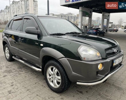 Зеленый Хендай Туксон, объемом двигателя 1.98 л и пробегом 295 тыс. км за 5950 $, фото 9 на Automoto.ua
