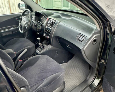 Зелений Хендай Туксон, об'ємом двигуна 1.98 л та пробігом 156 тис. км за 7999 $, фото 16 на Automoto.ua