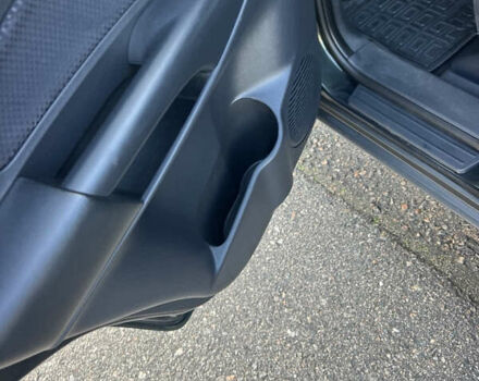 Зеленый Хендай Туксон, объемом двигателя 1.98 л и пробегом 130 тыс. км за 9100 $, фото 10 на Automoto.ua