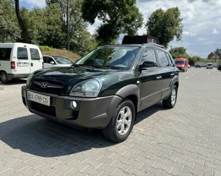 Зеленый Хендай Туксон, объемом двигателя 2.7 л и пробегом 200 тыс. км за 8500 $, фото 6 на Automoto.ua