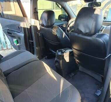 Зеленый Хендай Туксон, объемом двигателя 2 л и пробегом 115 тыс. км за 8500 $, фото 81 на Automoto.ua