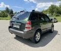 Зеленый Хендай Туксон, объемом двигателя 2.7 л и пробегом 200 тыс. км за 8500 $, фото 2 на Automoto.ua