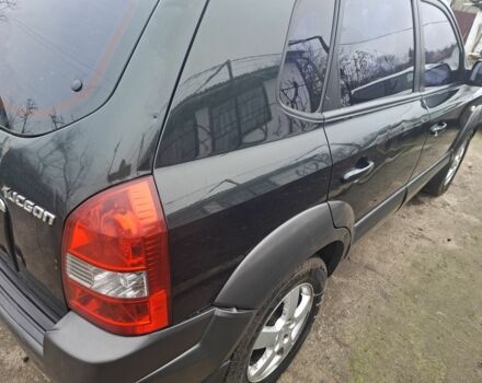 Зеленый Хендай Туксон, объемом двигателя 2 л и пробегом 228 тыс. км за 6500 $, фото 10 на Automoto.ua