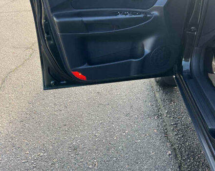 Зеленый Хендай Туксон, объемом двигателя 1.98 л и пробегом 130 тыс. км за 9100 $, фото 13 на Automoto.ua