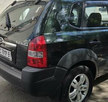 Зелений Хендай Туксон, об'ємом двигуна 1.98 л та пробігом 206 тис. км за 7100 $, фото 7 на Automoto.ua