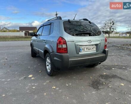 Зеленый Хендай Туксон, объемом двигателя 1.98 л и пробегом 168 тыс. км за 8800 $, фото 32 на Automoto.ua