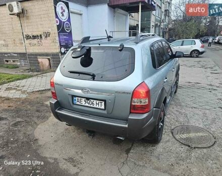 Зеленый Хендай Туксон, объемом двигателя 1.98 л и пробегом 158 тыс. км за 8300 $, фото 2 на Automoto.ua