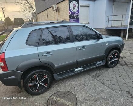 Зелений Хендай Туксон, об'ємом двигуна 2 л та пробігом 150 тис. км за 8331 $, фото 4 на Automoto.ua
