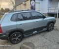 Зелений Хендай Туксон, об'ємом двигуна 2 л та пробігом 150 тис. км за 8331 $, фото 4 на Automoto.ua
