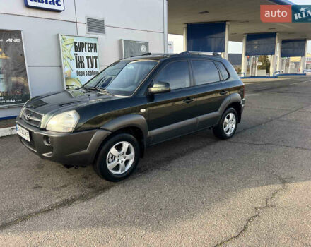 Зеленый Хендай Туксон, объемом двигателя 1.98 л и пробегом 130 тыс. км за 9100 $, фото 6 на Automoto.ua