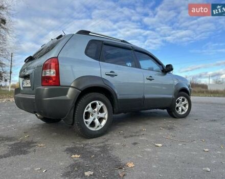 Зеленый Хендай Туксон, объемом двигателя 1.98 л и пробегом 168 тыс. км за 8800 $, фото 21 на Automoto.ua
