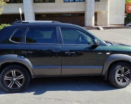 Зеленый Хендай Туксон, объемом двигателя 1.98 л и пробегом 200 тыс. км за 7000 $, фото 6 на Automoto.ua