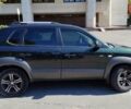 Зеленый Хендай Туксон, объемом двигателя 1.98 л и пробегом 200 тыс. км за 7000 $, фото 6 на Automoto.ua
