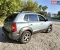Зелений Хендай Туксон, об'ємом двигуна 2 л та пробігом 240 тис. км за 8500 $, фото 7 на Automoto.ua
