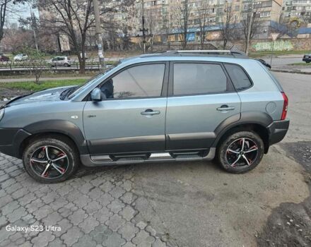 Зелений Хендай Туксон, об'ємом двигуна 2 л та пробігом 150 тис. км за 8331 $, фото 2 на Automoto.ua