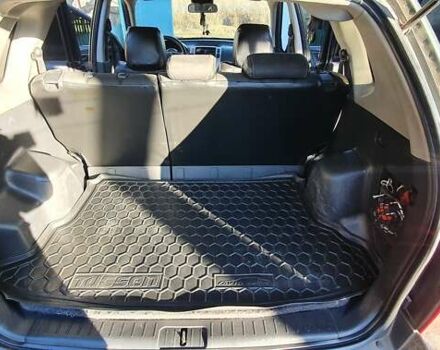 Зеленый Хендай Туксон, объемом двигателя 2 л и пробегом 115 тыс. км за 8500 $, фото 94 на Automoto.ua