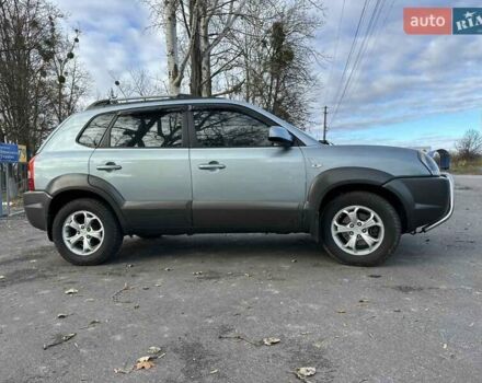 Зеленый Хендай Туксон, объемом двигателя 1.98 л и пробегом 168 тыс. км за 8800 $, фото 29 на Automoto.ua
