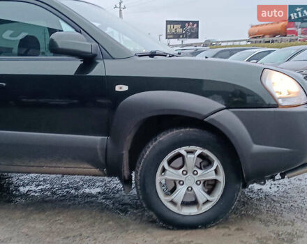 Зеленый Хендай Туксон, объемом двигателя 2 л и пробегом 223 тыс. км за 7290 $, фото 14 на Automoto.ua