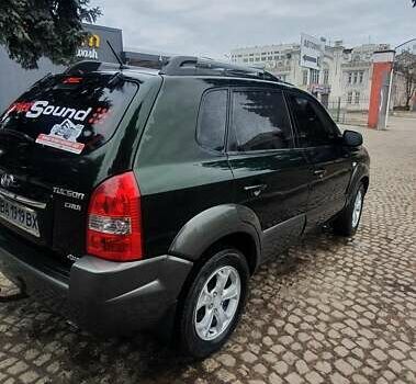 Зеленый Хендай Туксон, объемом двигателя 2 л и пробегом 115 тыс. км за 8500 $, фото 2 на Automoto.ua