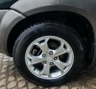 Зеленый Хендай Туксон, объемом двигателя 2 л и пробегом 115 тыс. км за 8500 $, фото 35 на Automoto.ua