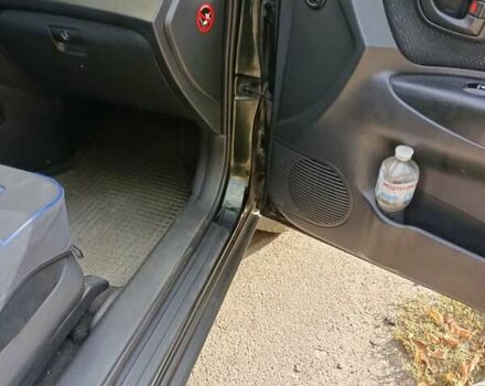 Зеленый Хендай Туксон, объемом двигателя 2 л и пробегом 140 тыс. км за 8800 $, фото 13 на Automoto.ua