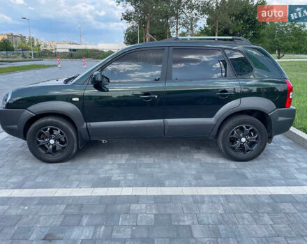 Зеленый Хендай Туксон, объемом двигателя 1.98 л и пробегом 180 тыс. км за 9200 $, фото 8 на Automoto.ua