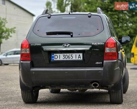 Зелений Хендай Туксон, об'ємом двигуна 1.98 л та пробігом 260 тис. км за 7199 $, фото 1 на Automoto.ua