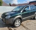 Зеленый Хендай Туксон, объемом двигателя 2 л и пробегом 186 тыс. км за 8800 $, фото 1 на Automoto.ua