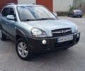 Зеленый Хендай Туксон, объемом двигателя 1.98 л и пробегом 122 тыс. км за 9000 $, фото 1 на Automoto.ua