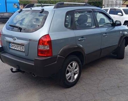 Зеленый Хендай Туксон, объемом двигателя 1.98 л и пробегом 122 тыс. км за 9000 $, фото 4 на Automoto.ua