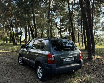 Зеленый Хендай Туксон, объемом двигателя 1.98 л и пробегом 180 тыс. км за 9999 $, фото 2 на Automoto.ua