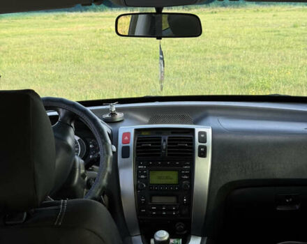 Зеленый Хендай Туксон, объемом двигателя 1.98 л и пробегом 180 тыс. км за 9999 $, фото 10 на Automoto.ua