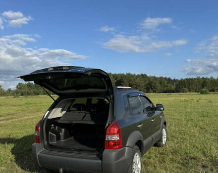 Зеленый Хендай Туксон, объемом двигателя 1.98 л и пробегом 180 тыс. км за 9999 $, фото 8 на Automoto.ua