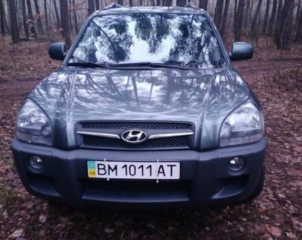 Зеленый Хендай Туксон, объемом двигателя 1.98 л и пробегом 146 тыс. км за 10000 $, фото 12 на Automoto.ua