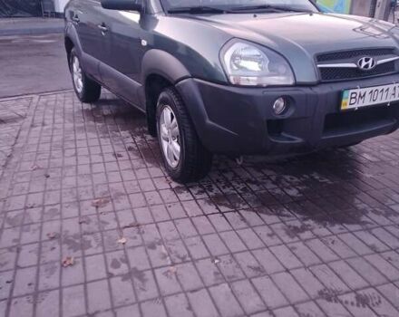 Зеленый Хендай Туксон, объемом двигателя 1.98 л и пробегом 146 тыс. км за 10000 $, фото 3 на Automoto.ua