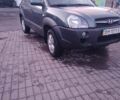 Зеленый Хендай Туксон, объемом двигателя 1.98 л и пробегом 146 тыс. км за 10000 $, фото 3 на Automoto.ua