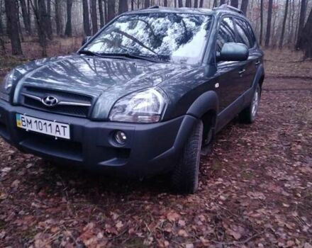 Зеленый Хендай Туксон, объемом двигателя 1.98 л и пробегом 146 тыс. км за 10000 $, фото 11 на Automoto.ua