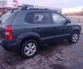 Зеленый Хендай Туксон, объемом двигателя 1.98 л и пробегом 146 тыс. км за 10000 $, фото 10 на Automoto.ua